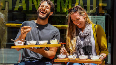 Two people eating ice cream on a Stretchy Pants Food tour