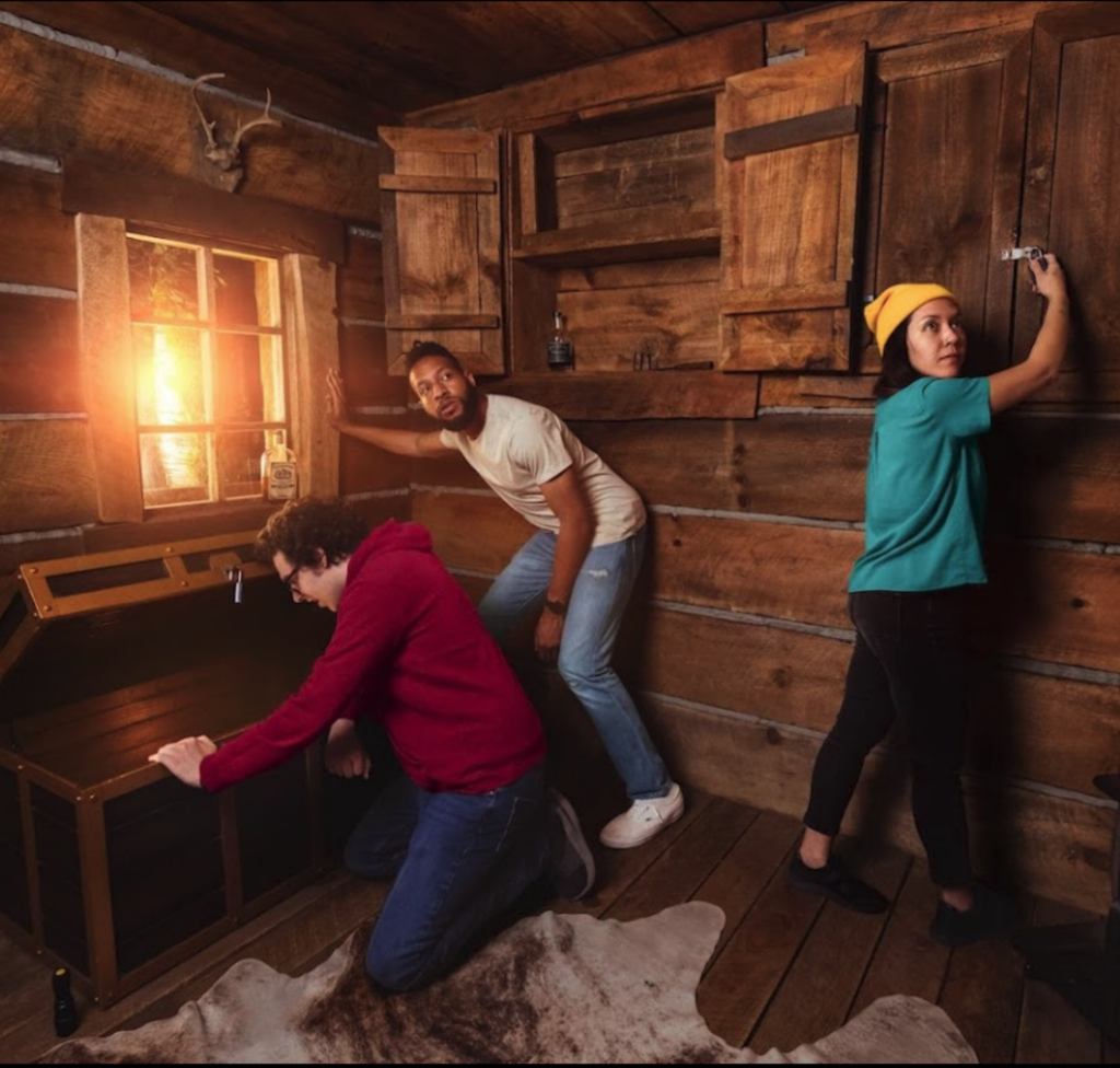 Team members solving puzzles in an escape room, a challenging and fun team building activity in San Francisco.