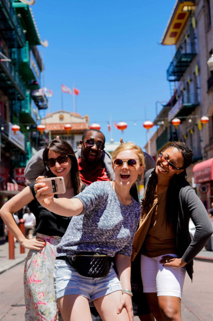 A group enjoying a food tour in San Francisco's Chinatown, exploring local cuisine.