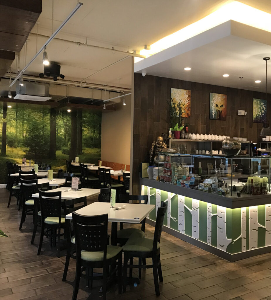 The spacious interior of Golden Era Vegan Restaurant, a San Francisco favorite offering Vietnamese-inspired vegan dishes and a buffet-style lunch.