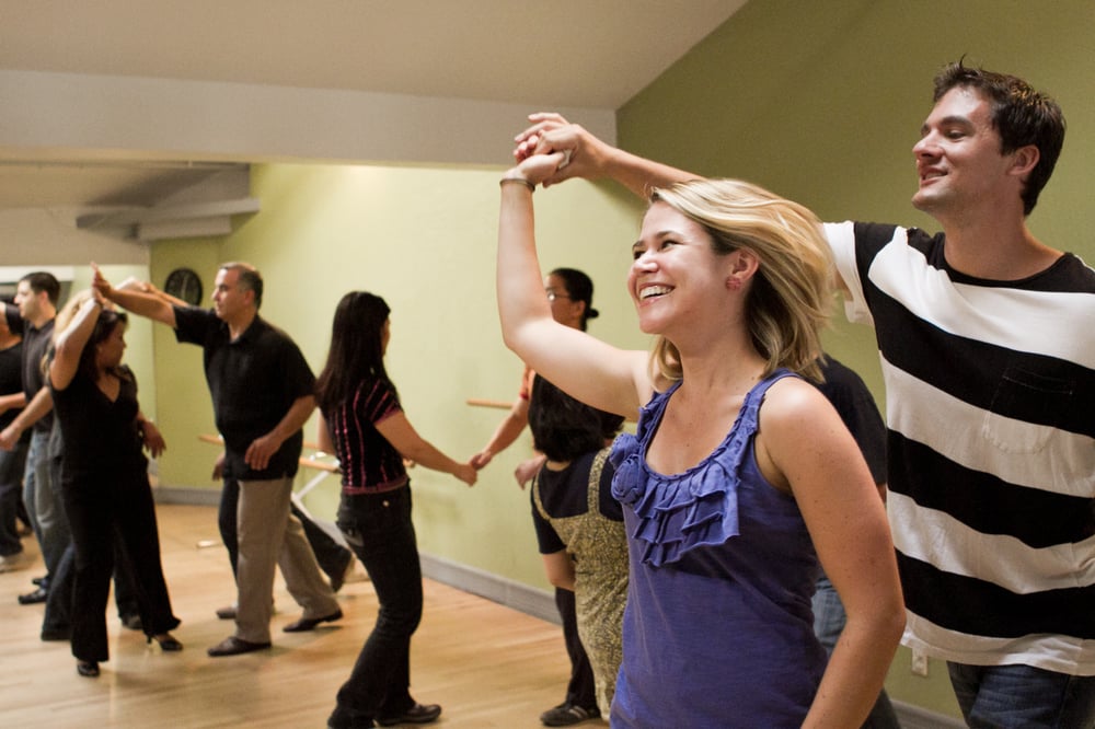 Participants in a salsa dance class in San Francisco, one of the engaging things to do on Valentine's Day